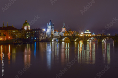 City landscape at night, bridge over the river