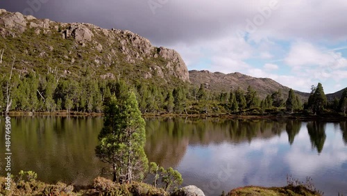 a sunset pan of the pool of siloam, zion hill and solomon's throne at walls of jerusalem national park in tasmania, australia photo