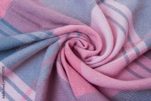 The fabric blue, pink and light pink colors, twisted in a spiral