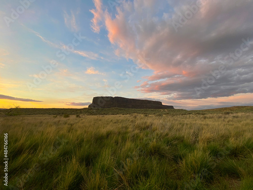 Steamboat Rock at sunset with pink clouds photo