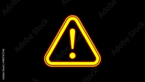 Blinking Yellow Warning symbol loop animation footage on black solid background. 2d photo