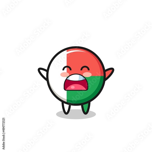 cute madagascar flag mascot with a yawn expression