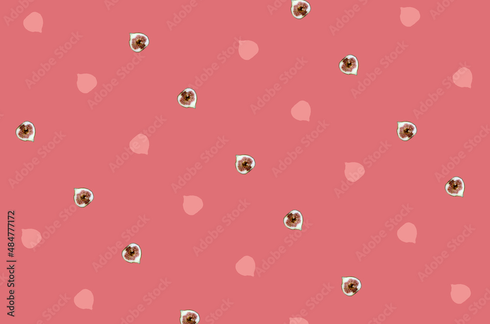 Colorful fruit pattern of fresh figs sliced on red background. Top view. Flat lay. Pop art design Colorful fruit pattern of fresh figs sliced on red background. Top view. Flat lay. Pop art design