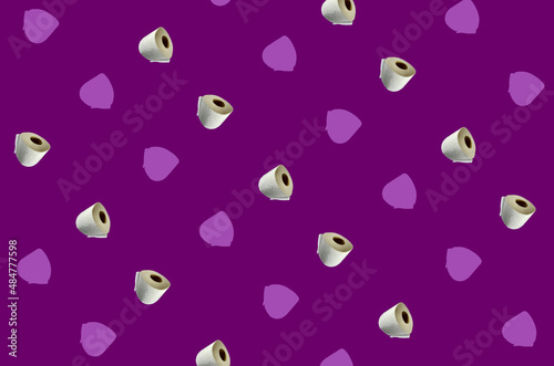 Colorful pattern of rolls of a white toilet paper isolated on violet background. Top view. Wallpaper for bathroom