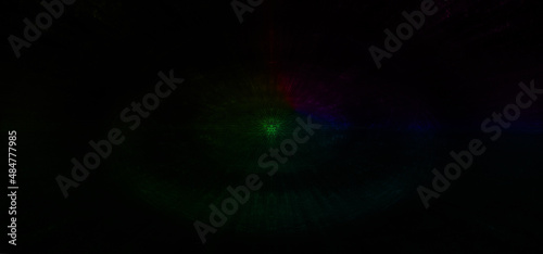 Abstract low key light burst background image.