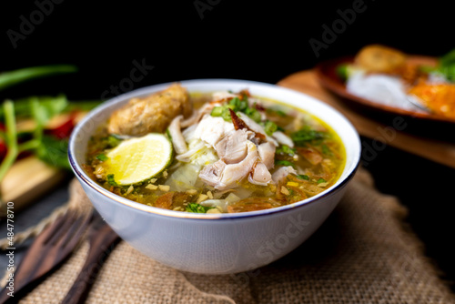 Soto Ayam is a traditional Indonesian soup mainly composed of broth, chicken and vegetables
