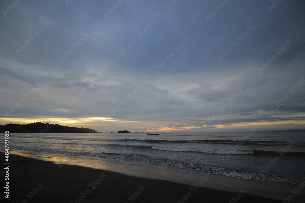 Beautiful sunset on Palangpang Beach, Ciletuh Global UNESCO Geopark, Sukabumi, West Java, Indonesia. Beautiful sunset on Palangpang Beach, Ciletuh Global UNESCO Geopark, Sukabumi, West Java, Indonesia.
