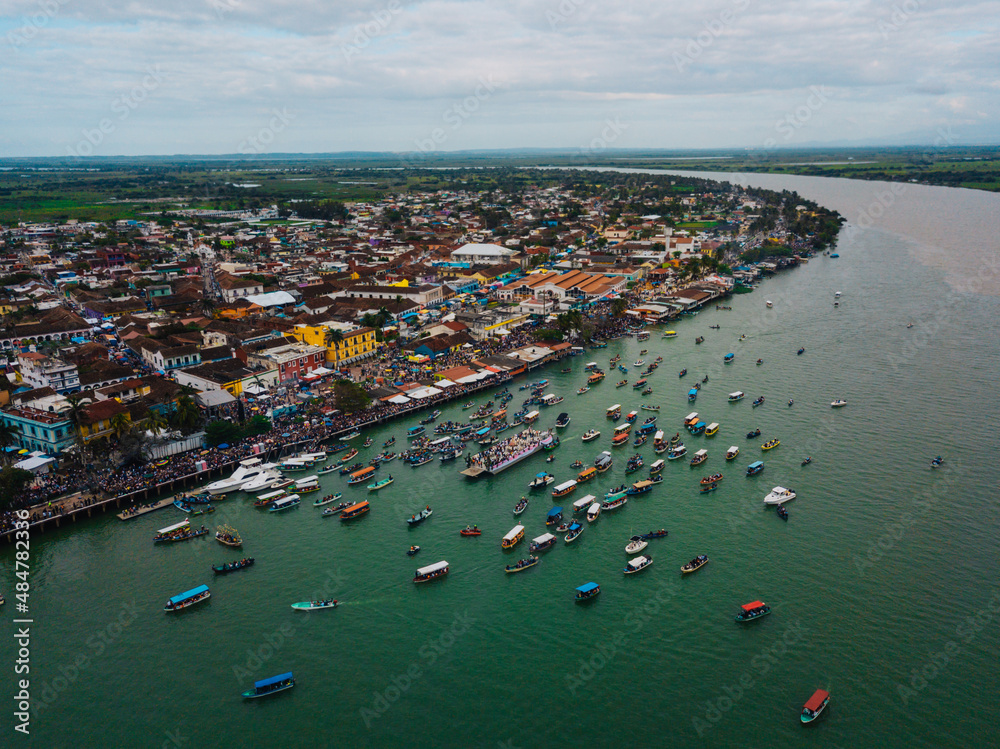 Aerial photo of many boats carrying the Virgen de la Candelaria in Tlacotalpan Veracruz, Mexico
