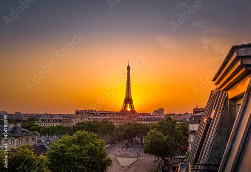 Amazing sunset behind Eiffel Tower in Paris, France