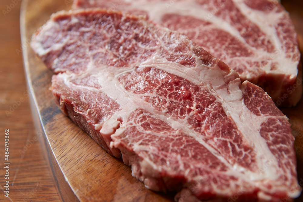 raw meat on a cutting board