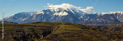 view of the Majella mountain in Abruzzo Italy with snowy peak. Banner.