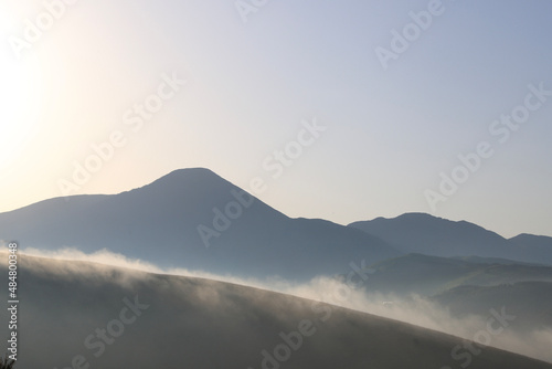 mountains in the fog