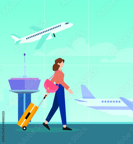 Women traveling at the airport terminal with suitcase to board the plane.