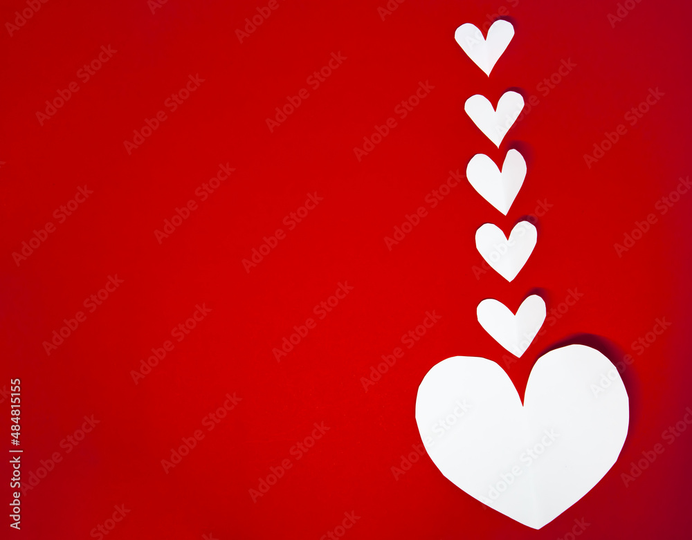 Valentine's day card concept. white hearts on red background, flat lay Valentine's day card concept. white hearts on red background, flat lay