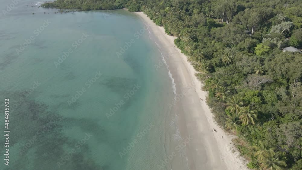 Flying Over Long Stretch Of Sandy Seashore With Pristine Water At Myall Beach In Cape Tribulation, Queensland Australia. Aerial Drone Flying Over Long Stretch Of Sandy Seashore With Pristine Water At Myall Beach In Cape Tribulation, Queensland Australia. Aerial Drone