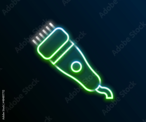 Glowing neon line Electrical hair clipper or shaver icon isolated on black background. Barbershop symbol. Colorful outline concept. Vector
