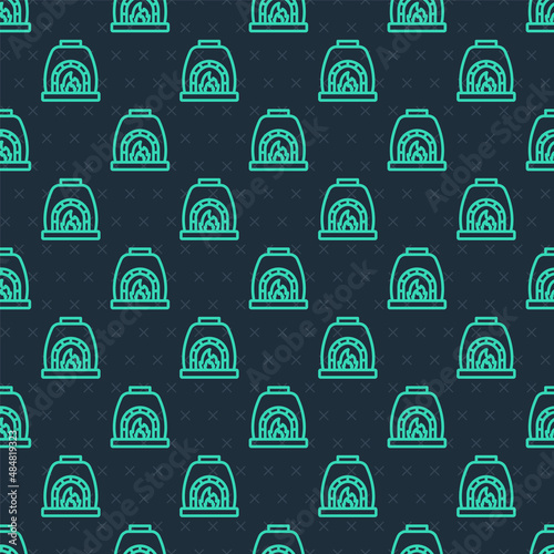 Green line Blacksmith oven icon isolated seamless pattern on blue background. Vector