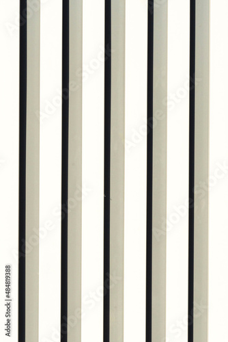 streams on a surface. A background with strips from color. vertical streams. Background abstract structure. strip, bar, ribbon, stripe texture