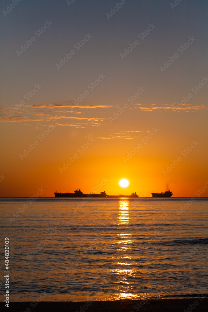 Tanker ship at sunset