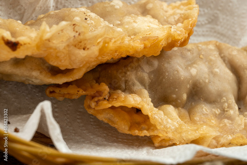 A homemade dish of Uzbek and Tatar cuisine, pasties with meat, suluguni cheese and herbs. Chebureks - fried pie with meat and onions. A traditional dish of Turkish and Mongolian cuisine.