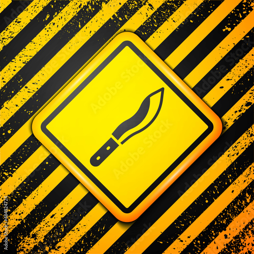 Black Machete or big knife icon isolated on yellow background. Warning sign. Vector