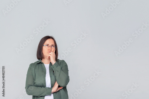 Small business owner woman on grey background. 