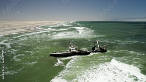 Drone orbit shows abandoned shipwreck of stranded vessel on Skeleton Coast photo