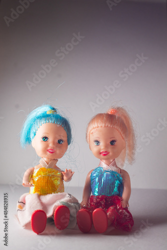 girls doll with beautiful hair. two dolls for girls games. children's playmates at home. 