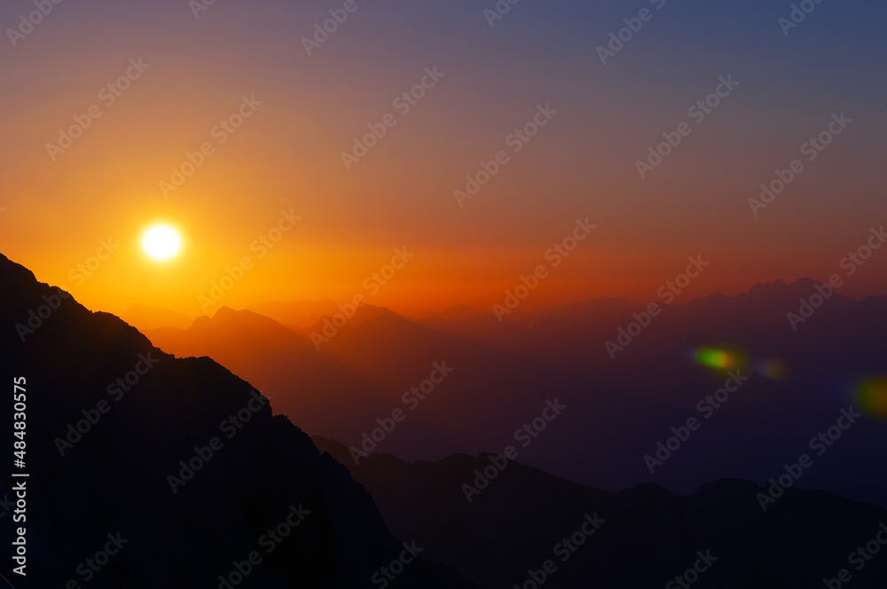 Beautiful sunrise over Julian Alps from Kredarica in Slovenia, Triglav National Park