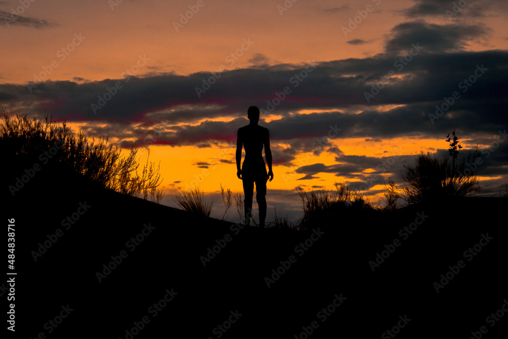 Silhouette of a person in the sunset