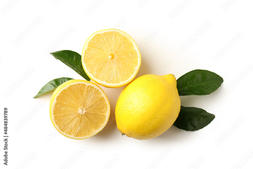 Lemons and leaves on white background, top view Lemons and leaves on white background, top view