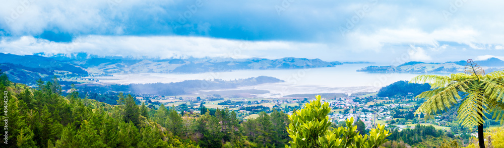 New Zealand jungle panorama hills and bay On the horizon