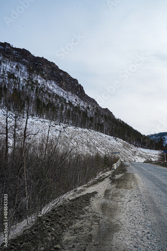 road to baikal, ice of baikal, blue ice of baikal with methane bubbles, transparent ice of baikal, boat on ice