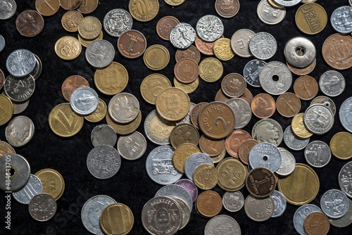 Miscellaneous isolated coins on a black background