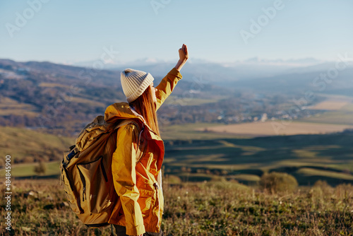 woman traveler admiring the landscape mountains nature Fresh air