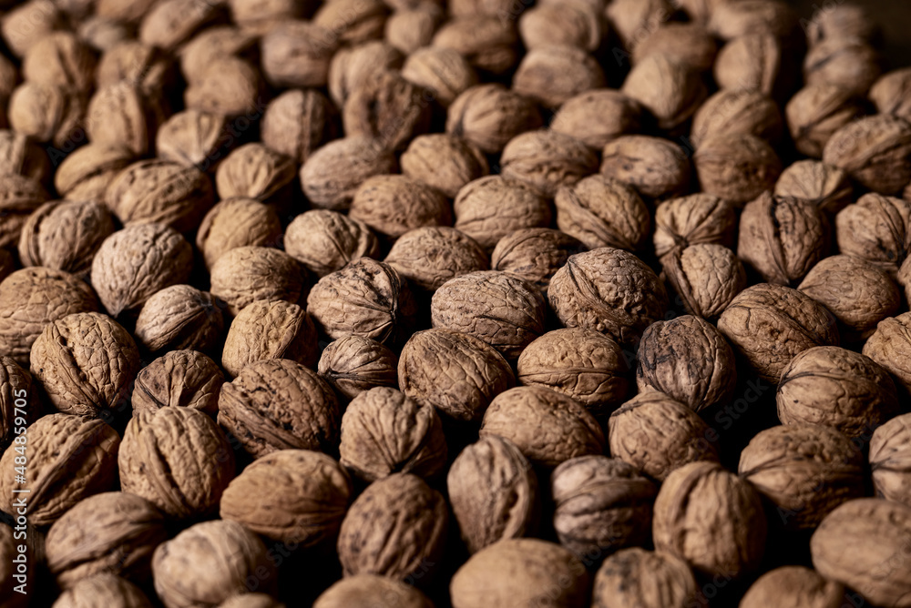 Several walnuts are on the table. Several walnuts are on the table.