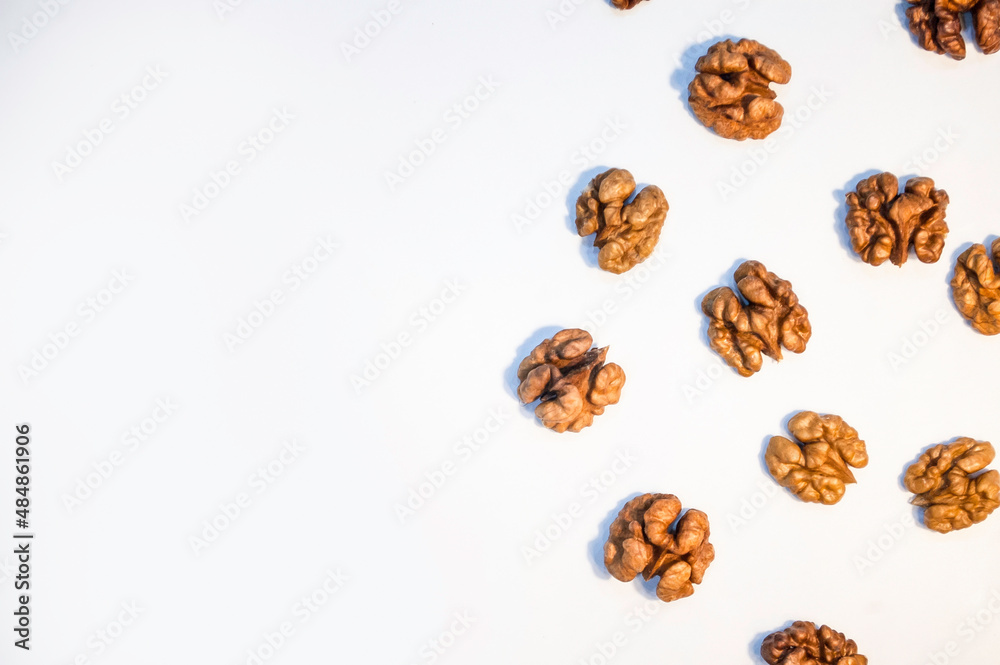 Stack of walnuts on white background Stack of walnuts on white background