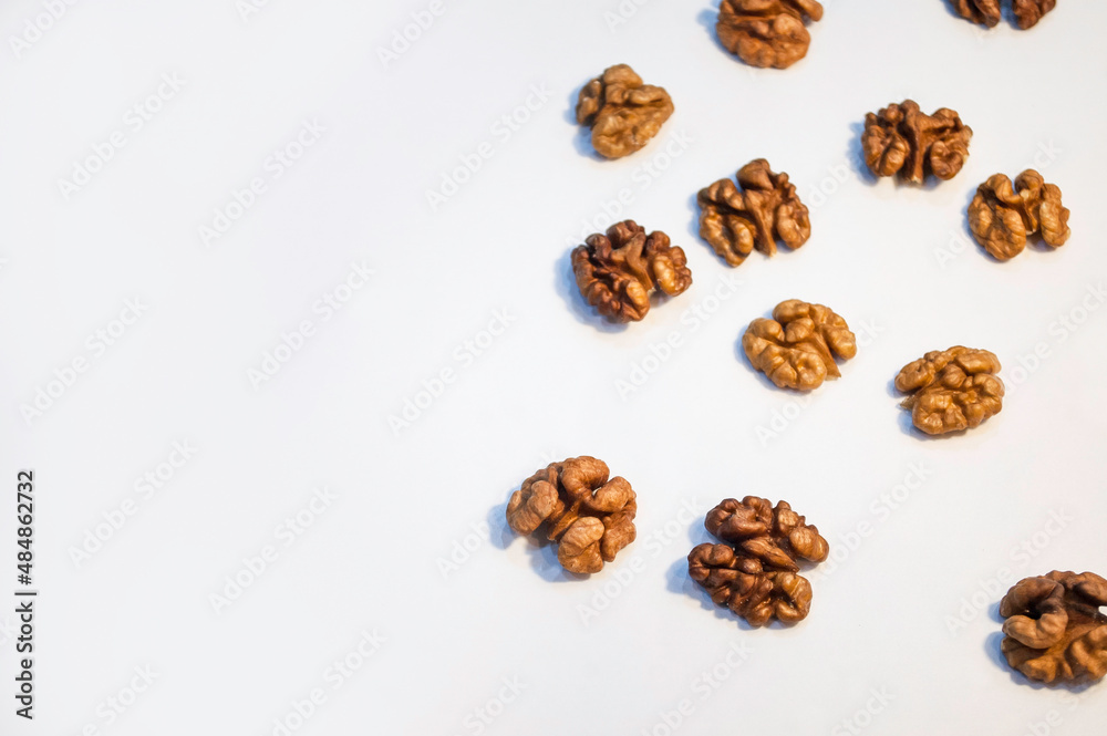 Stack of walnuts on white background Stack of walnuts on white background