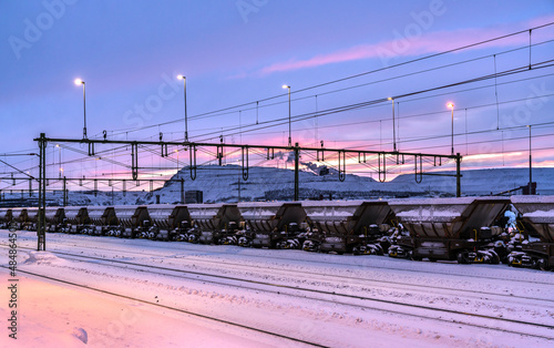 Freight train with iron ore at Kiruna railway station in Swedish Lapland photo