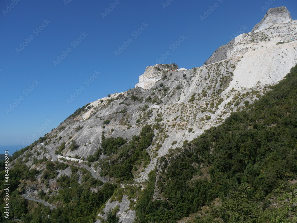 panorama from Colonnata on marble quarries among the green of the Apuan Alps from the village of Codena