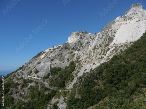 panorama from Colonnata on marble quarries among the green of the Apuan Alps from the village of Codena