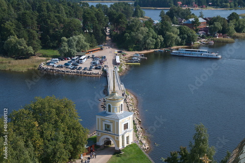 Tver Region, Russia - August 30, 2021: The monastery of the Nilo-Stolobenskaya deserts. Altitude view of the Svetlitskaya Tower and Lake Seliger photo