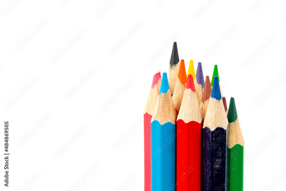 Colored pencils in a stack isolated on a white background. close-up, copy space Colored pencils in a stack isolated on a white background. close-up, copy space
