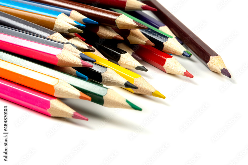 Colored pencils isolated on white background. close-up, copy space