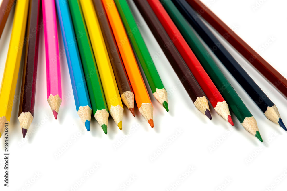 Colored pencils isolated on white background. close-up, copy space