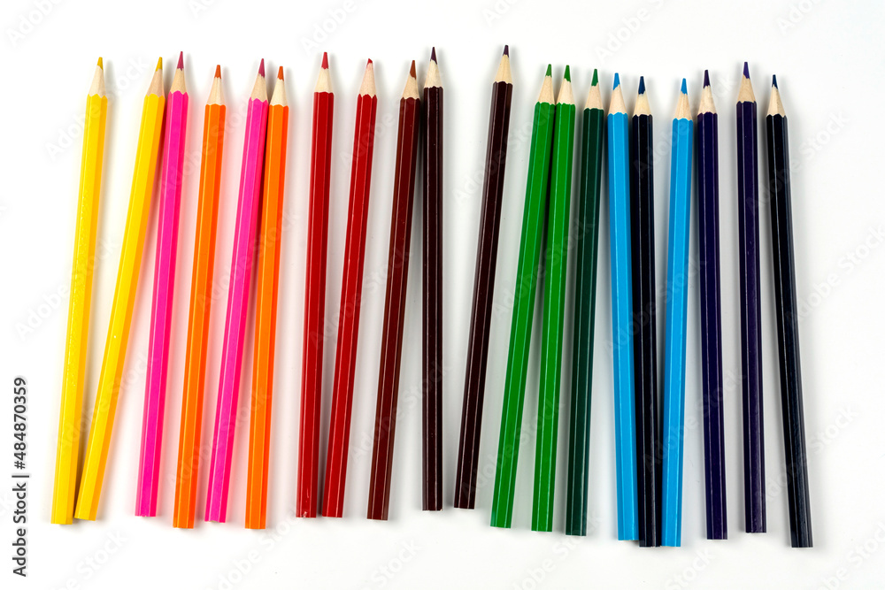Colored pencils isolated on white background. close-up, copy space Colored pencils isolated on white background. close-up, copy space