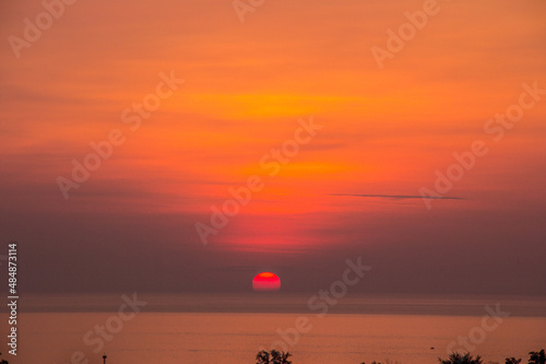 Red sun before sunset over the sea