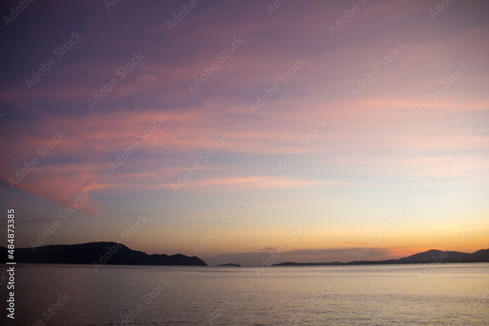 Sunset in the beach with purple twilight Sunset in the beach with purple twilight