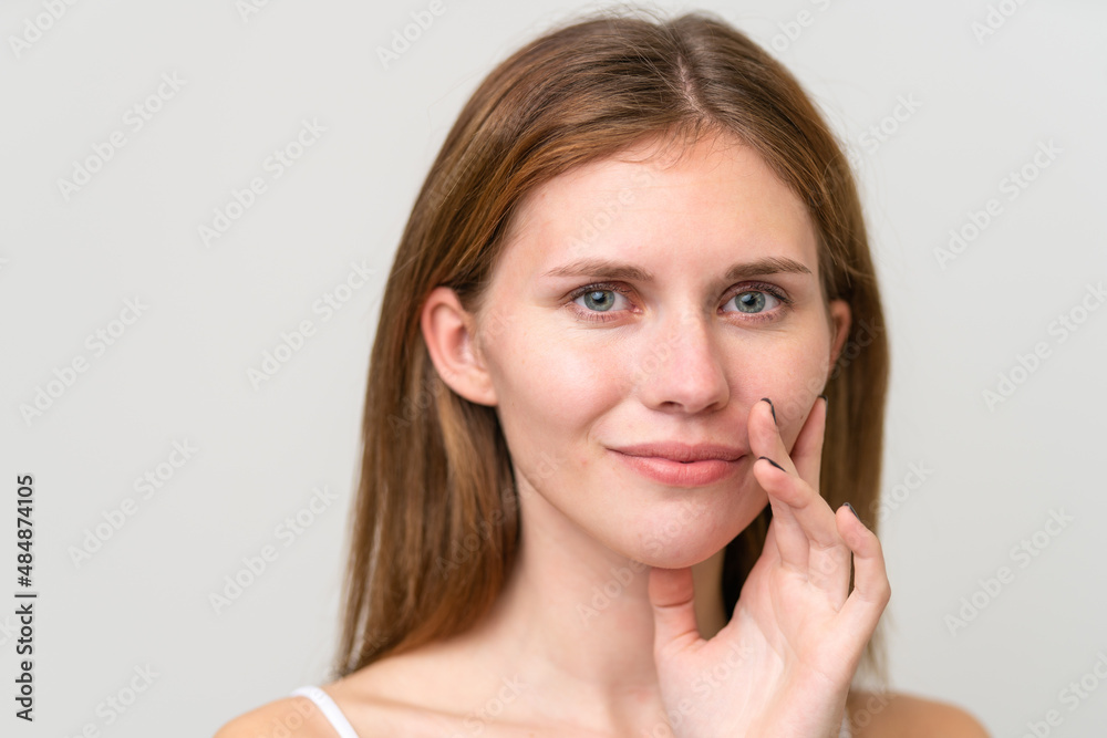 Portrait of pretty young woman over isolated white background Portrait of pretty young woman over isolated white background