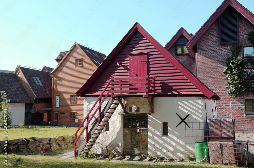 View of outbuildings in Bergen on a clear sunny day, Norway. Travel landscape sights of Europe.